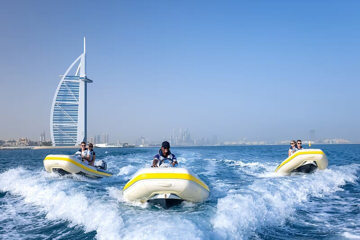 Experience Dubai's stunning coastline aboard your own boat passing iconic landmarks and enjoying warm sun on the water perfect for both adventure lovers and those seeking relaxation.